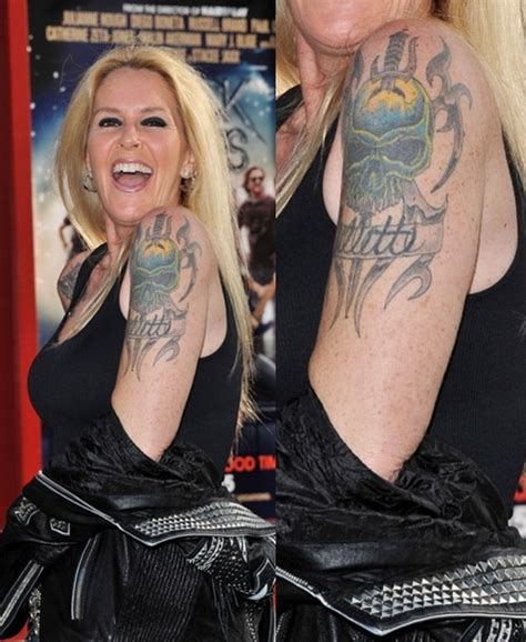 lita ford tattoos|lita ford ripped jeans.